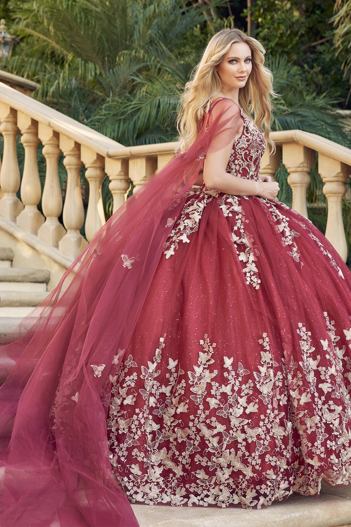 Juliet 1442 butterfly appliqué cape quinceanera dress back three-quarter view with sheer cape