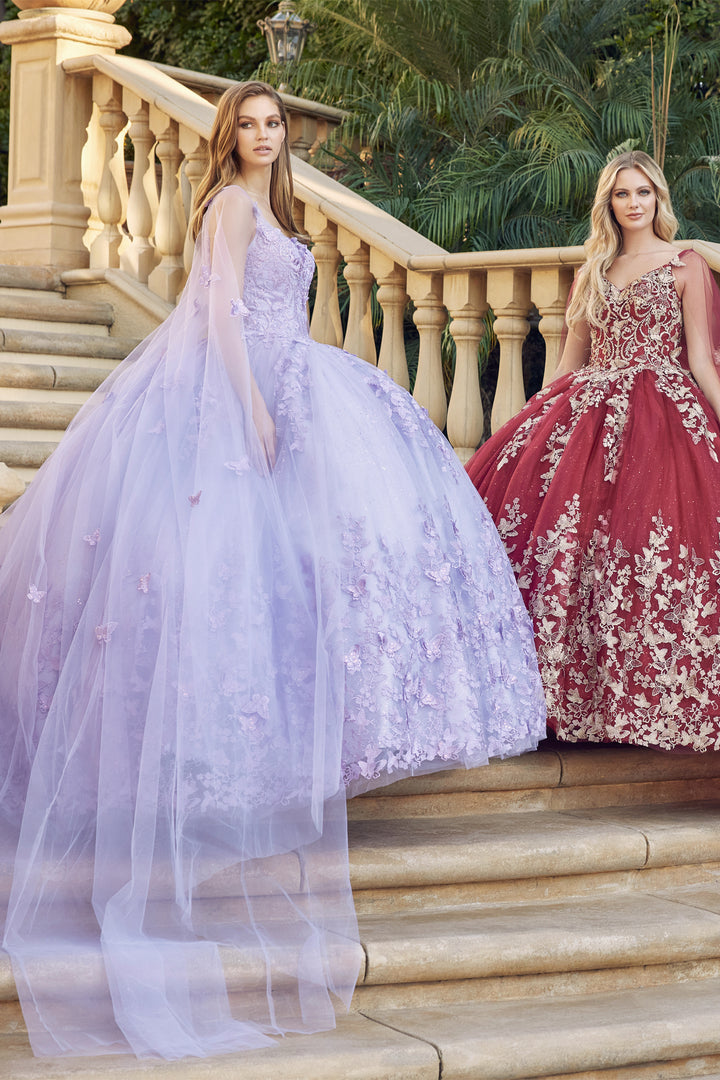 Juliet 1442 butterfly appliqué cape quinceanera dress three-quarter view on staircase