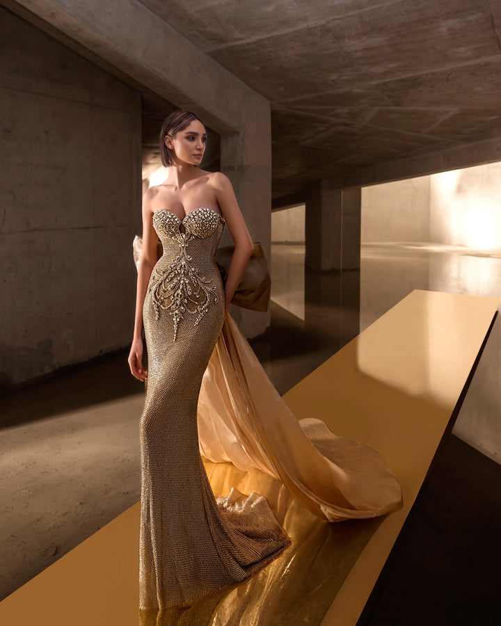 Delilah LD12064 Strapless Crystal Cup Mermaid Gown with Oversized Back Bow Train - Champagne front view