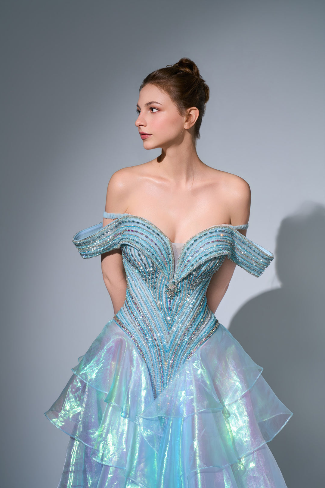 Delilah SH11630 Off-the-Shoulder Crystal Corset Gown with Iridescent Ruffle Skirt - Green close-up view