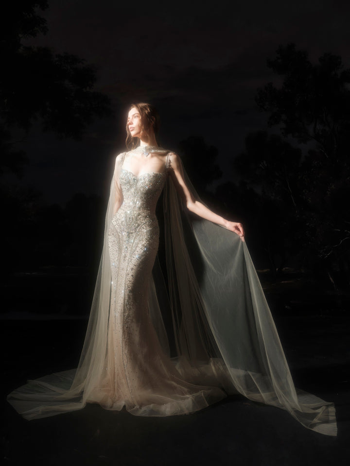 Delilah SH12066 Off-the-Shoulder Crystal Corset Mermaid Gown with Choker Tulle Cape - Champagne side view