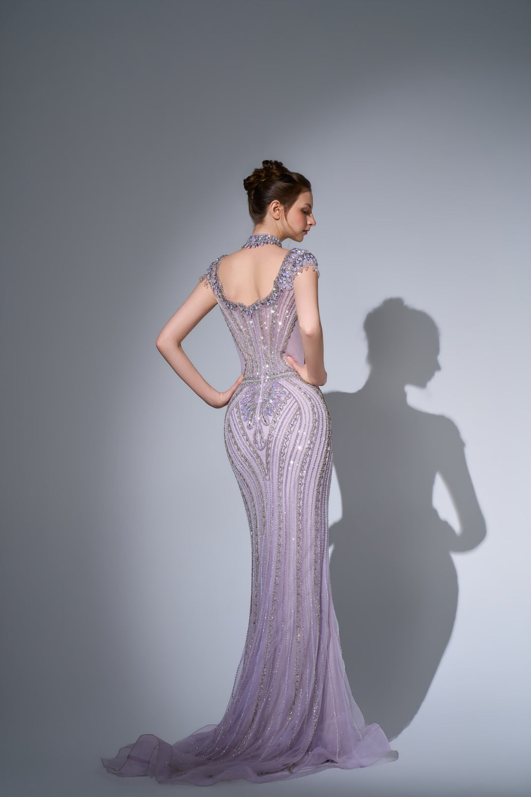 Delilah SH12057 High Neck Cap Sleeve Crystal Mermaid Gown with Ruffled Overskirt - Lilac back view