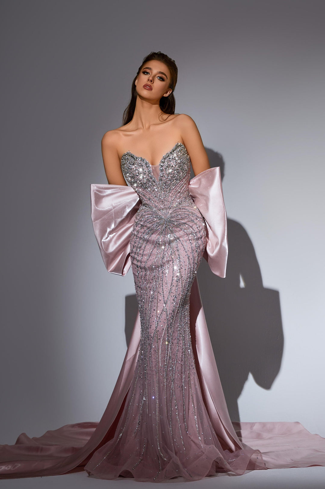 Delilah LD11486 Strapless Sweetheart Beaded Corset Sheath Gown with Oversized Back Bow Train - Pink front view