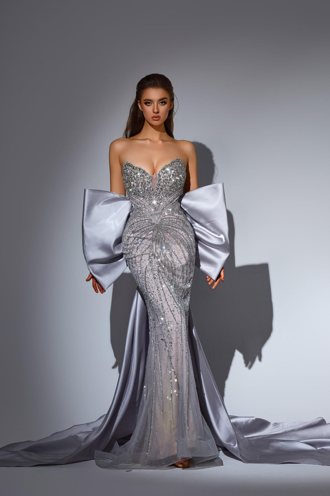 Delilah LD11486 Strapless Sweetheart Beaded Corset Sheath Gown with Oversized Back Bow Train - Grey front view