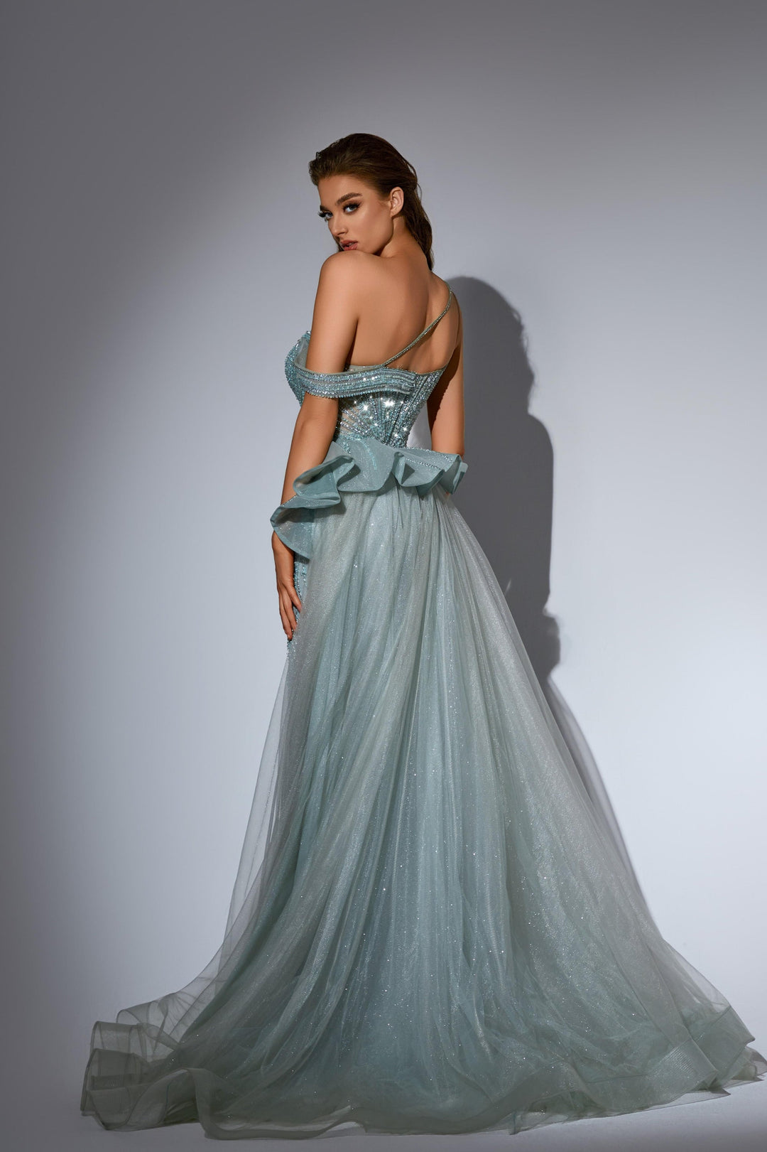 Delilah HM202 Asymmetric Plunging Beaded Mermaid Gown with Ruffled Overskirt and Slit - Green back view