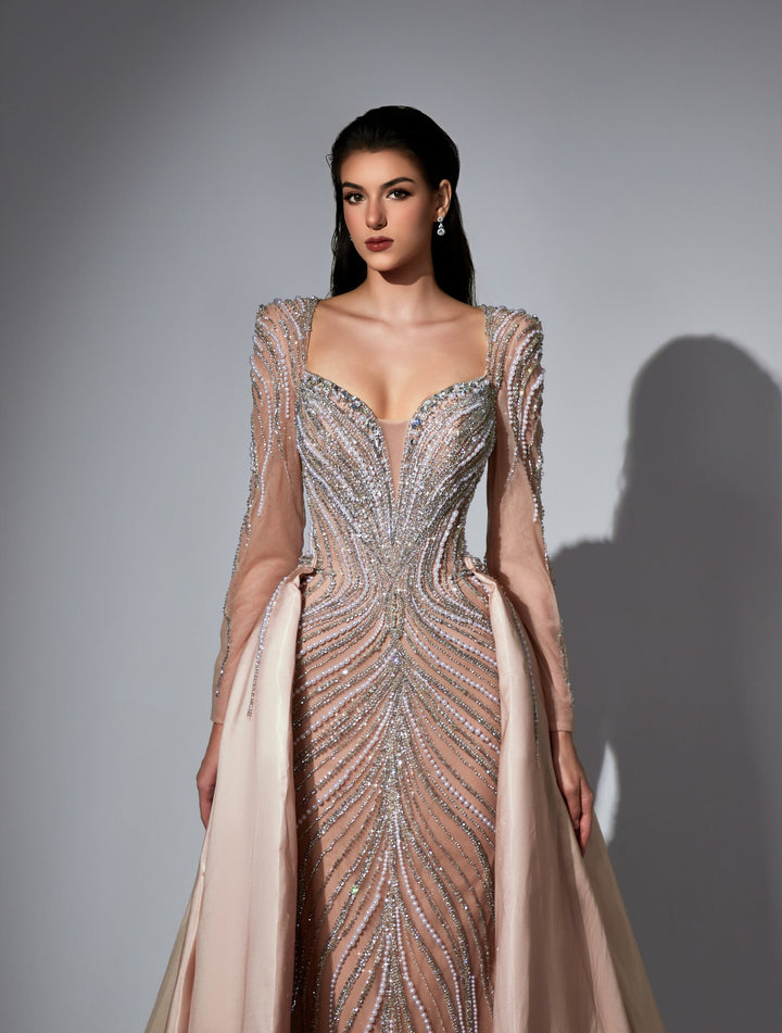 Delilah LD11475 Plunging Illusion Long Sleeve Beaded Corset Sheath Gown with Overskirt - Champagne close-up view