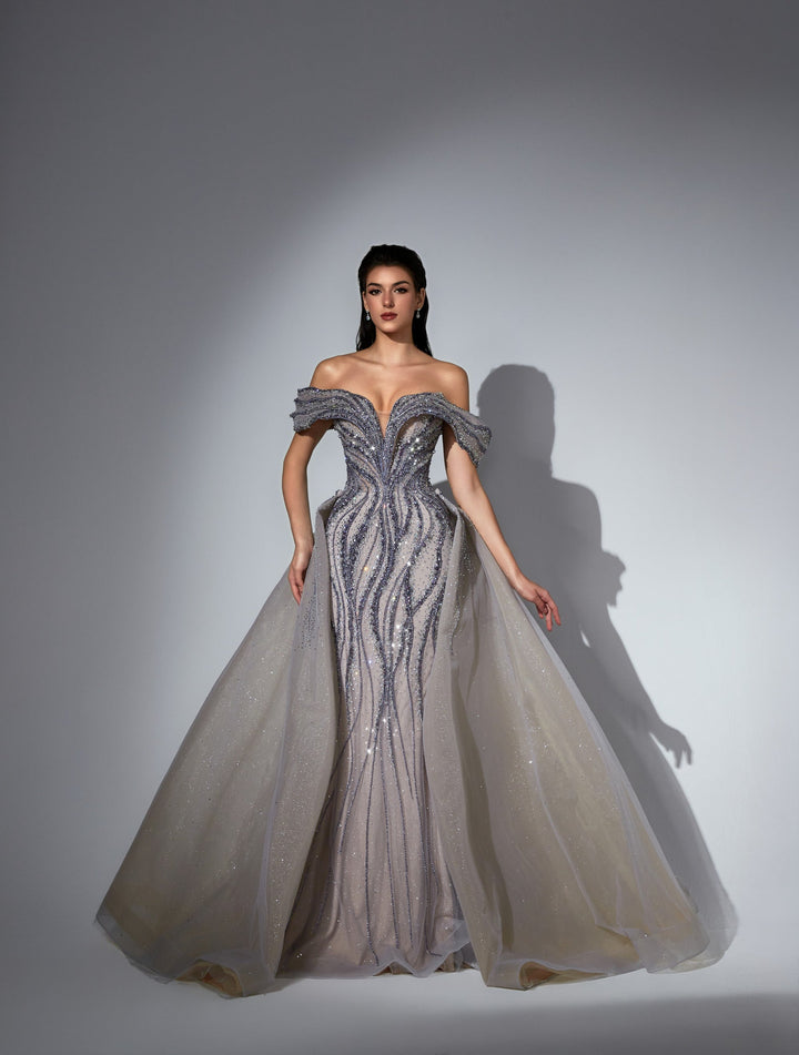 Delilah LD11538 Off-the-Shoulder Plunging Beaded Mermaid Gown with Sparkle Overskirt - Purple front view