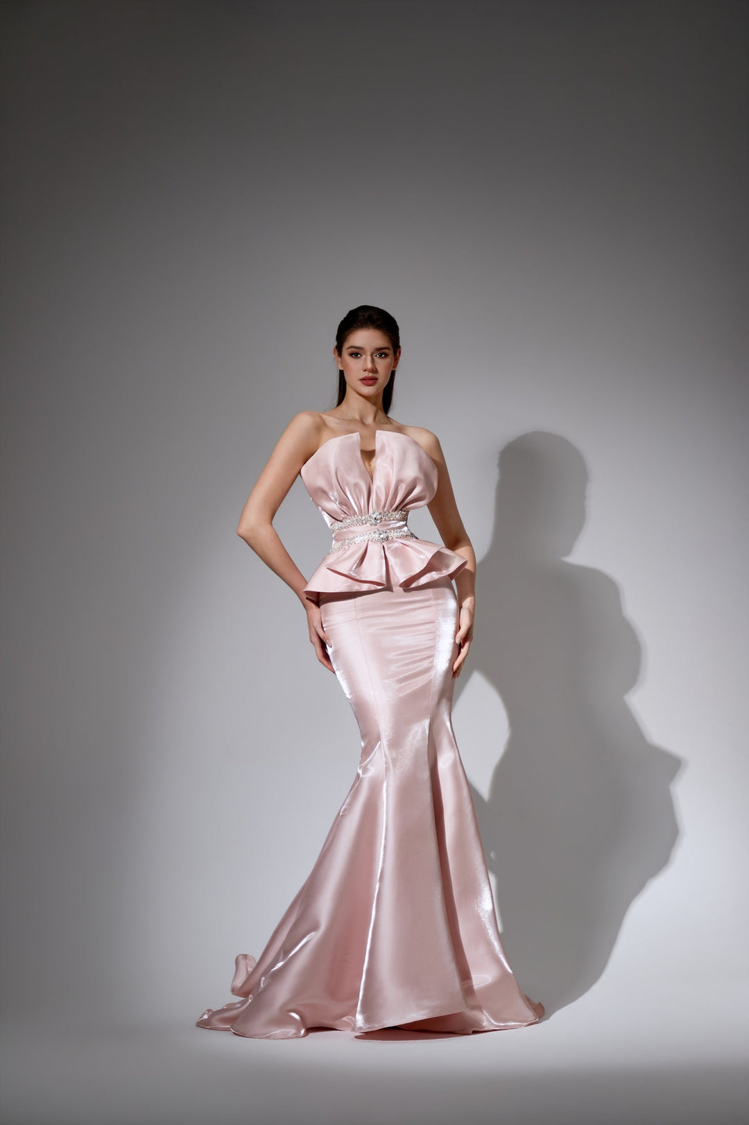 Delilah LD41044 Strapless Pleated Mermaid Gown with Ruffled Peplum and Crystal Waist - Pink front view