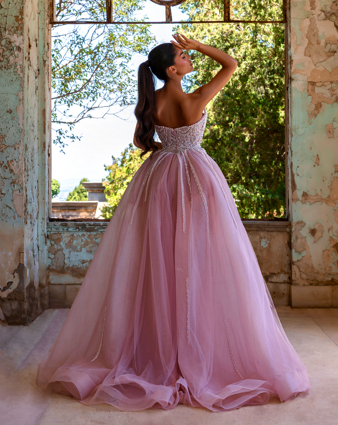 Delilah LD21131 Strapless Pearl and Crystal Corset Sheath Gown with Full Overskirt - Pink back view