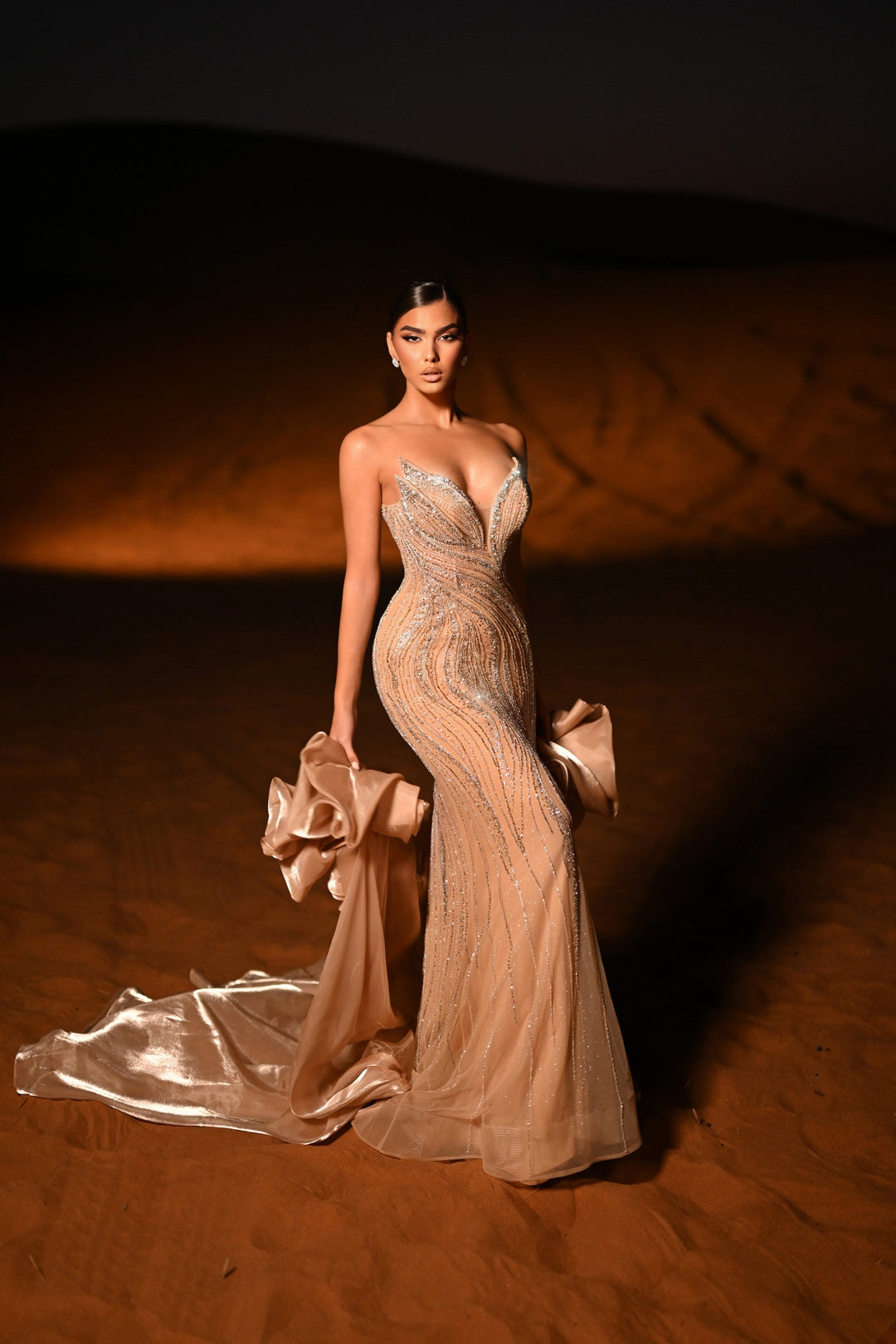 Delilah HM402 Strapless Plunging Sweetheart Beaded Mermaid Gown with Ruffled Overskirt - Champagne front view
