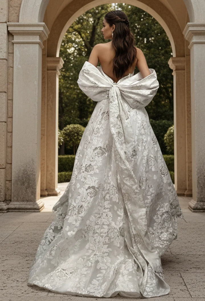 Jovani JB47701 Floral Brocade Ball Gown With Dramatic Bow Train