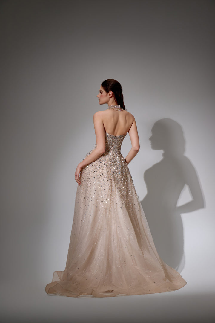 Delilah SH12020 Strapless Sequin Bodice A-Line Gown with Sparkle Skirt - Champagne back view