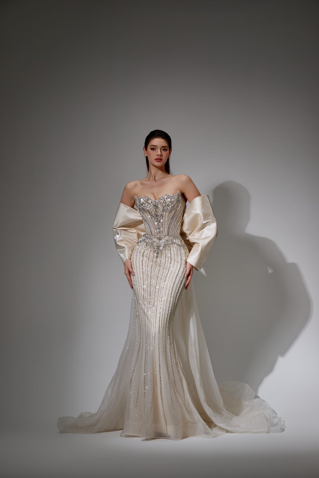 Delilah SH12053 Strapless Crystal Cup Corset Mermaid Gown with Statement Back Bow and Overskirt - White front view
